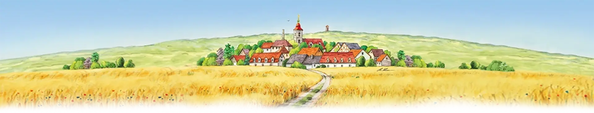 Eine malerische Ansicht eines Dorfes umgeben von weiten, goldenen Getreidefeldern.